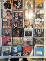 All 24 CDs laid out in four rows