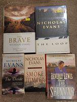 Group shot of all five books showing titles and formats