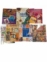 All seven instructional books laid out showing front covers