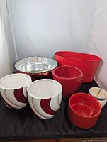 Group shot showing all eight planters and dish