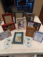 Front view showing entire assortment of frames on table