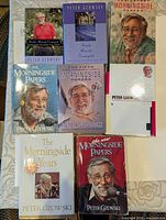 All eight Peter Gzowski books laid out on surface
