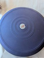 Top view showing full disc and central Sissel badge