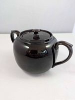 Front view of bean pot with lid showing color and shape