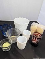 Group view of all glass holders, planter and tea lights