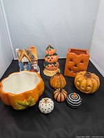 All nine ceramic Halloween pieces grouped together