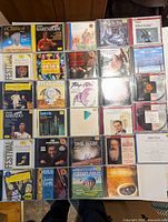 All 29 classical music CDs laid out on tabletop