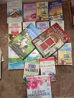All 17 books spread out; mix of paperback and hardcover