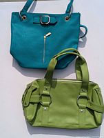 Teal tote and green satchel front view