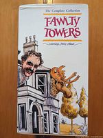 Front of sealed Fawlty Towers Complete Collection VHS box showing artwork