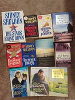 All 11 paperback books laid out showing covers