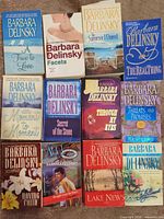 All 12 Barbara Delinsky paperback novels laid out in 3x4 grid