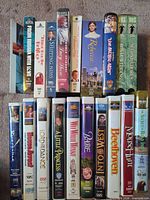 Two shelves of VHS spines showing top and bottom rows of the lot