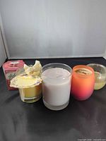 Front view of all five glass jar candles