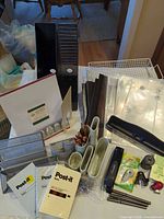 Full layout of office supplies on table