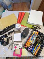 Entire lot laid out on table showing major items