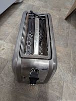 Top view showing two long slots and power cord