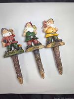 Full view of the three gnome garden stakes