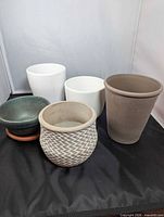 Group shot of all five pots showing colors and shapes