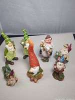 Group shot of all seven resin gnome figurines