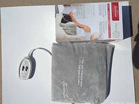 Pad laid out with controller and box visible
