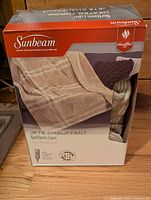 Front of Sunbeam Northern Luxe Heated Throw retail box