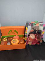 Both boxed gift sets closed and open view