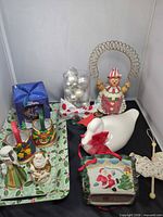 Group view of entire lot including tray, figurines, baskets, vase, duck, card holder and ornaments