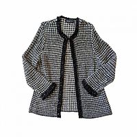 Front view of black and white sweater jacket laid flat