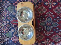 top view of wood stand with two stainless bowls