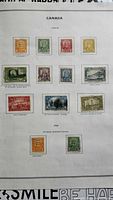 Album page showing 12 of the Canadian 1928-30 stamps