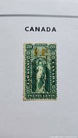 Front view of the 1864 Canada Ontario 20¢ law stamp on album page