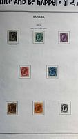 Album page showing seven Maple Leaf issue stamps