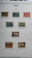 Full album page showing eight 1908 Quebec Tercentenary stamps
