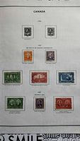Full album page with eight Canadian stamps from 1926-1927