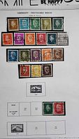 Full album page showing 21 German stamps