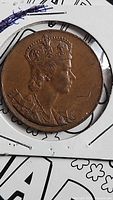 Obverse Queen Elizabeth II crowned portrait on commemorative token