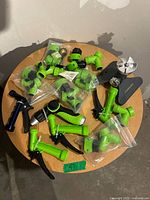 Overview of all garden hose adapters, nozzles and sprinkler on table