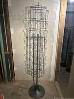 Full view of floor-standing metal card rack