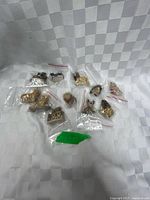 All 11 Wade figurines in bags