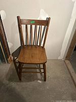 Front view of wooden spindle-back chair
