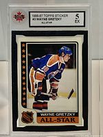 Front view of 1986-87 Topps Wayne Gretzky All-Star sticker in KSA slab graded 5 EX