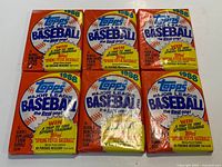 Front view of six unopened 1988 Topps MLB wax packs