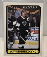 Front view of 1990-91 O-Pee-Chee Wayne Gretzky #120 card in sleeve