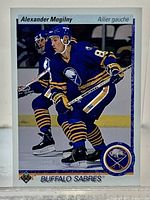 Front of 1990-91 Upper Deck French Mogilny rookie card showing player in Sabres uniform