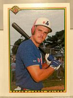 Front view of 1990 Bowman Larry Walker #117 rookie card showing image, logo and caption