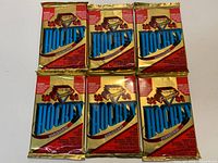 Front view of six sealed O-Pee-Chee Premier Series II hockey card packs