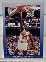 Front view of the Michael Jordan 1989-90 All-Sports Superstars Series II promo trading card showing image, border, and name.