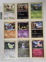 Nine Pokémon TCG cards in 9-pocket sleeve (Lillipup to Alomomola)