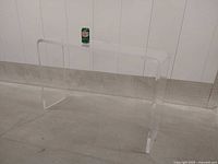 Full view of clear acrylic console
